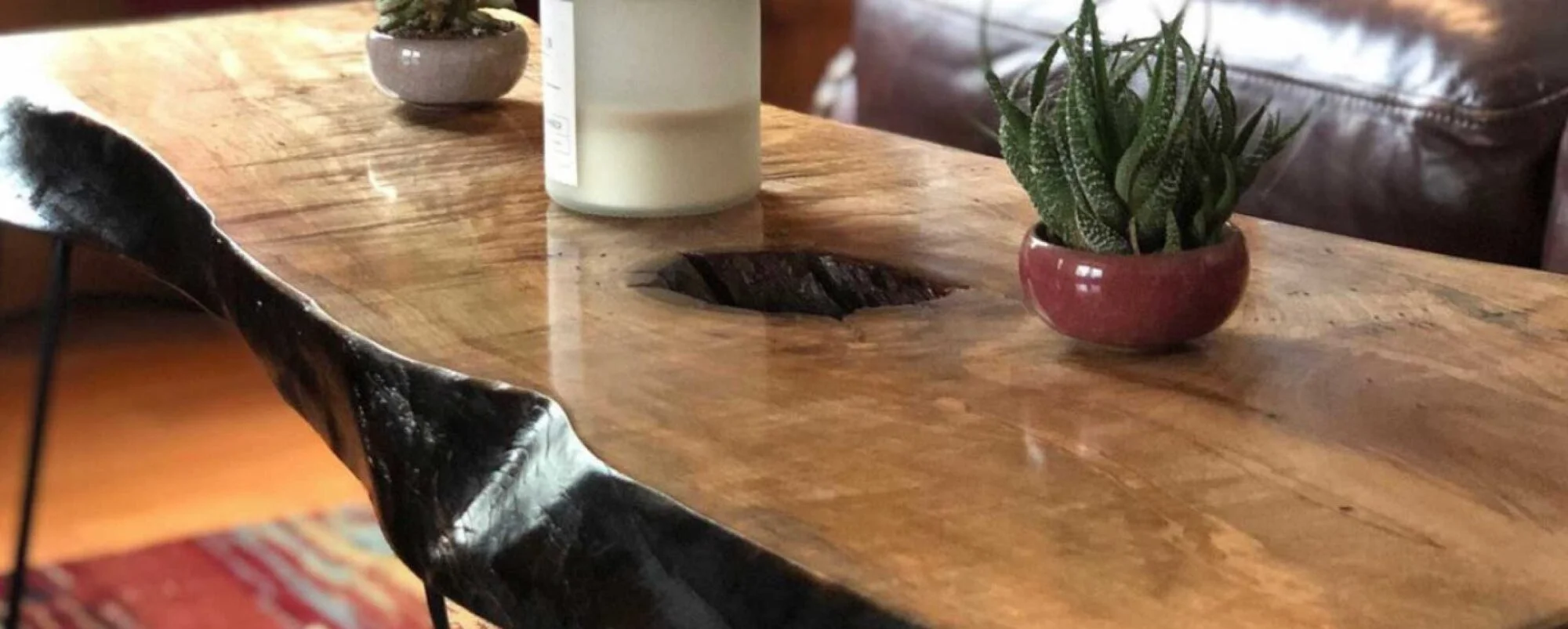 Live edge slab coffee table with a natural bark edge